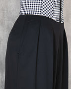 Amy Jumpsuit side view, details of tuck and pocket. 