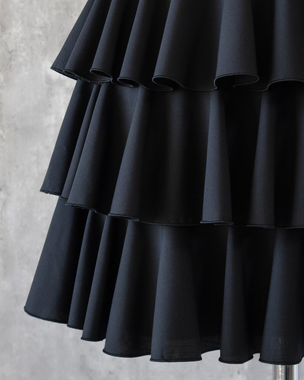 Amy Ruffle Skirt frill detail — subtle sheen fabric