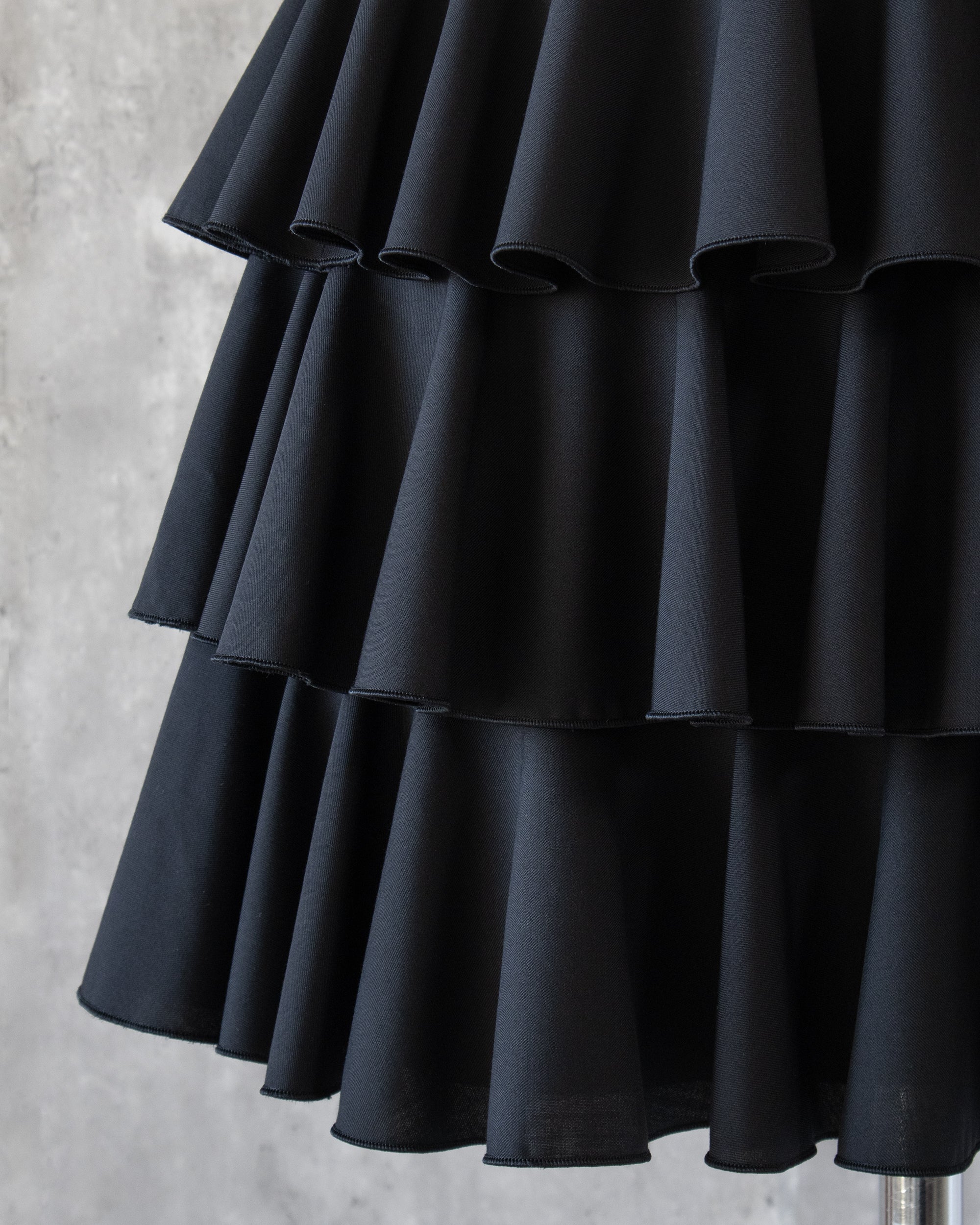 Amy Ruffle Skirt frill detail — subtle sheen fabric