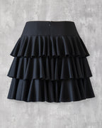 Amy Ruffle Skirt in black — back view, concealed zipper closure