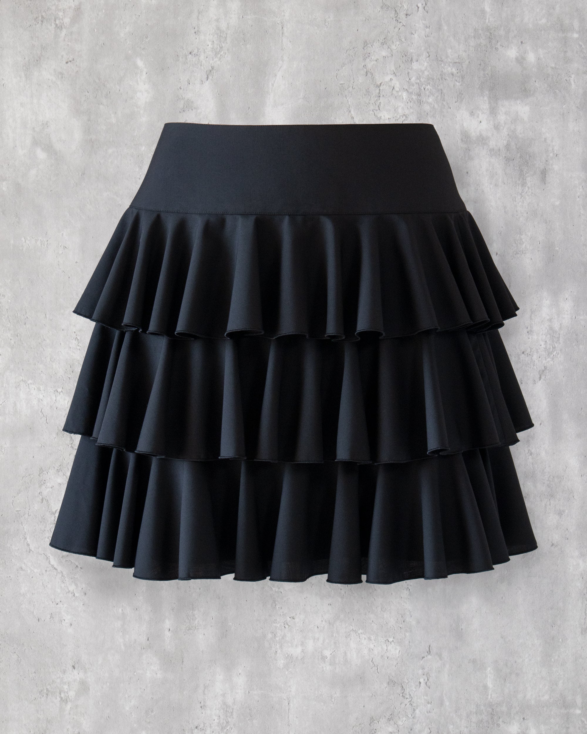 Amy Ruffle Skirt in black — front view, three-tier frill