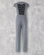 Carla Jumpsuit in indigo hickory denim — back view, black skull-motif lace