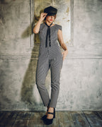 Model wearing Carla Jumpsuit in indigo hickory denim — front, Atë