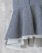 Frill hem detail in hickory denim and dot tulle — Carla Skirt by Atë