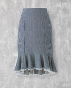 High-waisted denim skirt in indigo hickory stripe with frill hem — Carla Skirt by Atë, front view