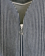Zip-front detail with star charm in hickory stripe denim — Carla Jumpsuit by Atë