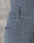 Pocket and waist belt detail in hickory stripe denim — Carla Jumpsuit by Atë