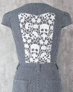 White skull lace detail on indigo hickory denim — Carla Jumpsuit by Atë, back panel close-up