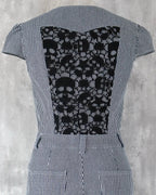 White skull lace detail on indigo hickory denim — Carla Jumpsuit by Atë, back panel close-up