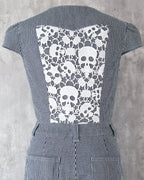 Carla Jumpsuit in indigo hickory denim — detail of white skull-motif lace on the back