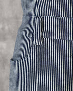 Carla Jumpsuit in indigo hickory denim — detail of pocket and waist belt