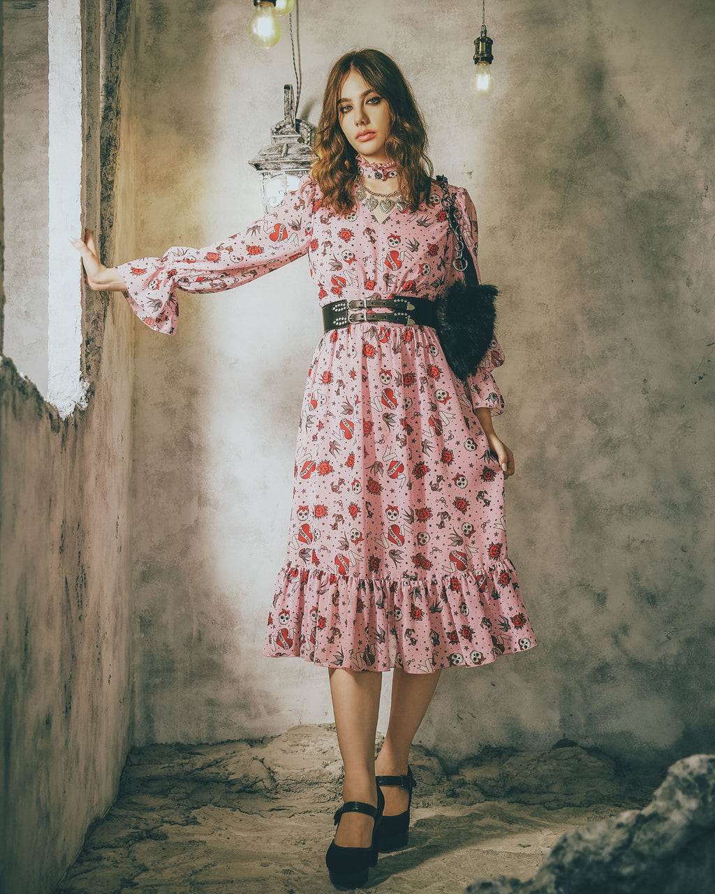 Model in a pale dusty pink chiffon midi dress, tattoo print with roses and swallows — Katie Dress by Atë