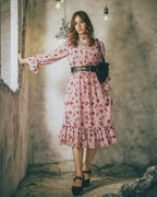 Model in a pale dusty pink chiffon midi dress, tattoo print with roses and swallows — Katie Dress by Atë